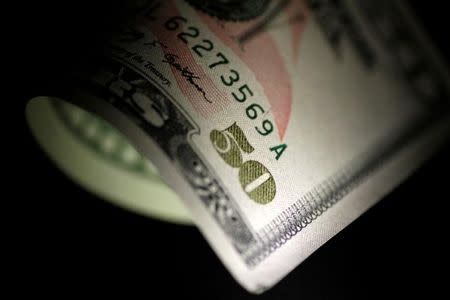 Dollar turns lower ahead of Fed decision