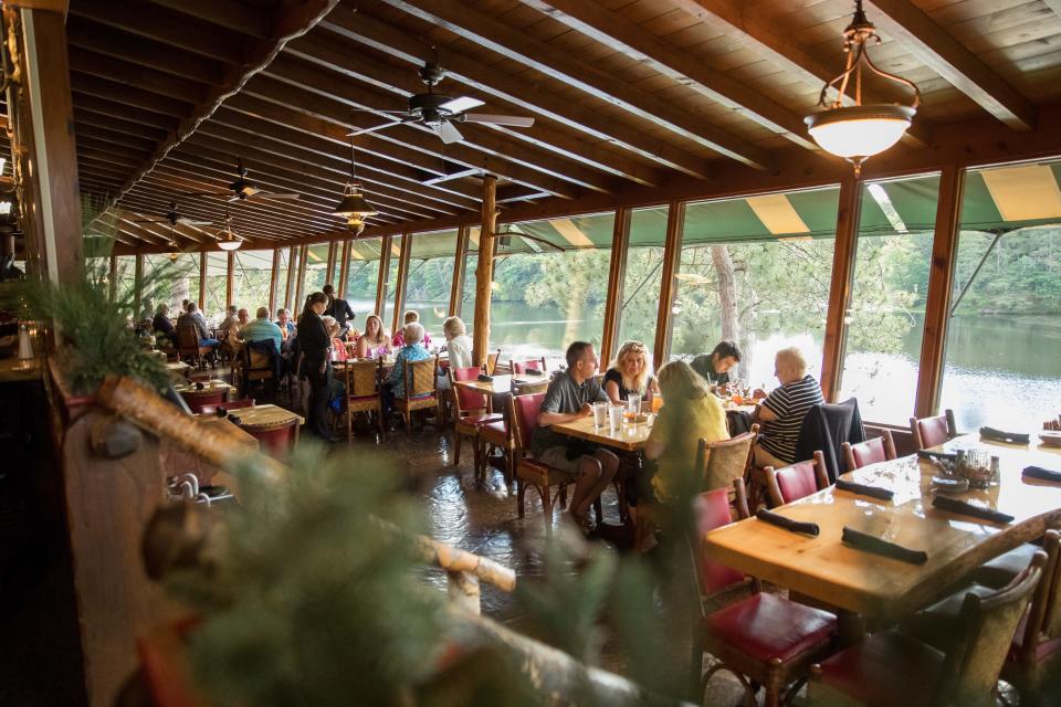 Diners enjoy views of Mirror Lake at Ishnala Supper Club in Lake Delton.