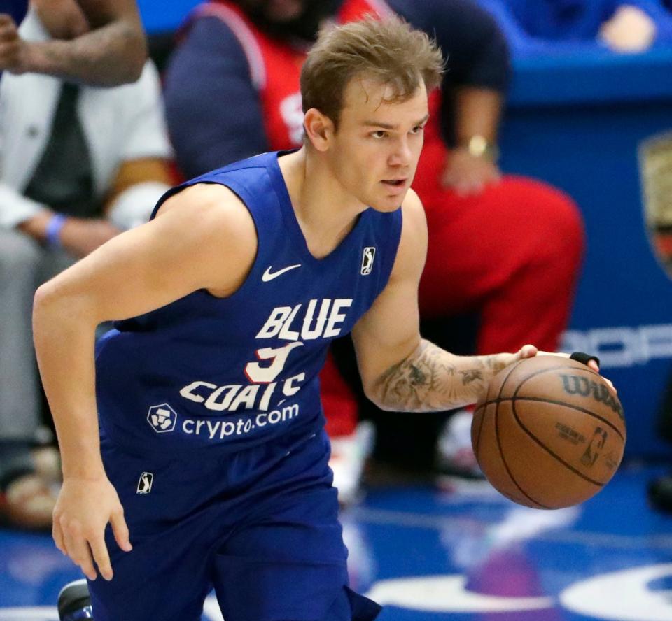 Blue Coats' Mac McClung takes the ball up court as he returns to the Blue Coats in a G League game at the Chase Fieldhouse Wednesday, Feb. 22, 2023.