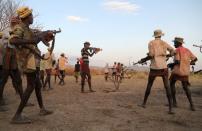 The Wider Image: When raiders menace in northern Kenya, grab your guns