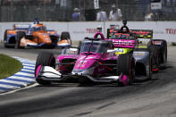 Alexander Rossi (27) races during the second race of the IndyCar Detroit Grand Prix auto racing doubleheader on Belle Isle in Detroit Sunday, June 13, 2021. (AP Photo/Paul Sancya)