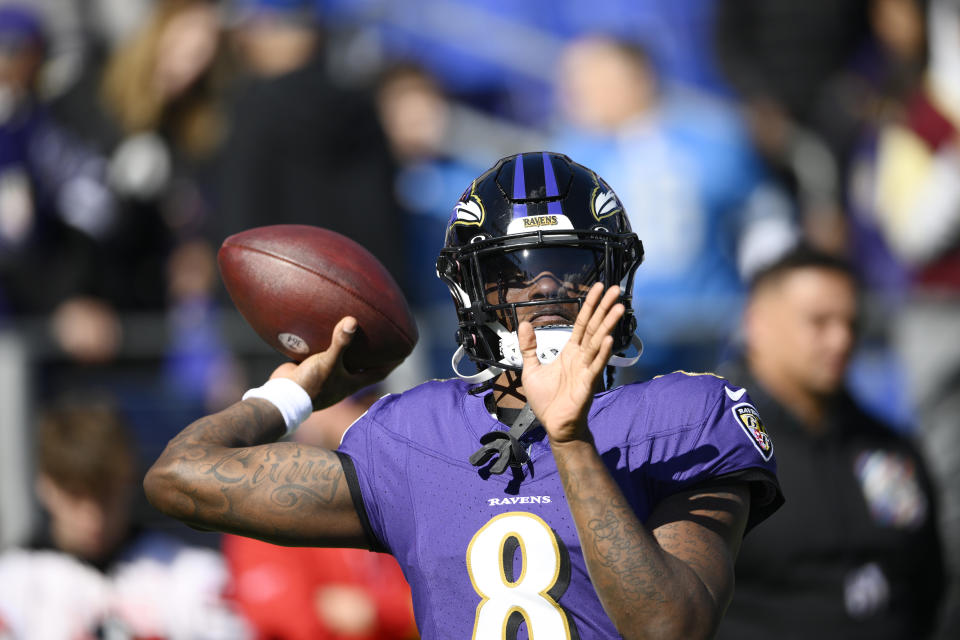 Baltimore Ravens quarterback Lamar Jackson warms up before the NFL football game against the Detroit Lions, Sunday, Oct. 22, 2023, in Baltimore. (AP Photo/Nick Wass)