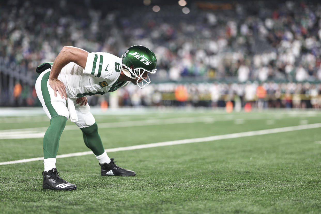 EAST RUTHERFORD, NEW JERSEY - SEPTEMBER 11: Aaron Rodgers #8 of the New York Jets stretches as he warms up prior to a game against the Buffalo Bills at MetLife Stadium on September 11, 2023 in East Rutherford, New Jersey. (Photo by Michael Owens/Getty Images)