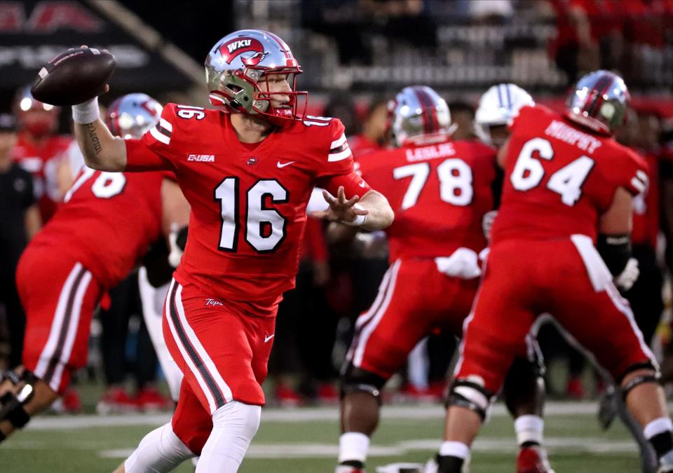 Western Kentucky quarterback Austin Reed (16) passes the ball during a 2023 game against Middle Tennessee. The former St. Augustine quarterback signed as an undrafted free agent with the Chicago Bears.