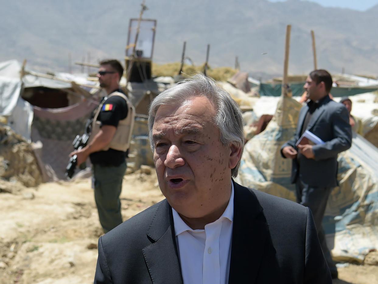 UN Secretary General visits refugees in Afghanistan in June 2017. He is set to appoint a Russian official as the head of a new counter-terrorism division of the world body: SHAH MARAI/AFP/Getty Images