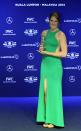 U.S. swimmer Missy Franklin holds her Laureus World Sportswoman of the Year trophy as she poses for photos during the Laureus World Sports Awards in Kuala Lumpur, Malaysia, Wednesday, March 26, 2014. (AP Photo/Lai Seng Sin)