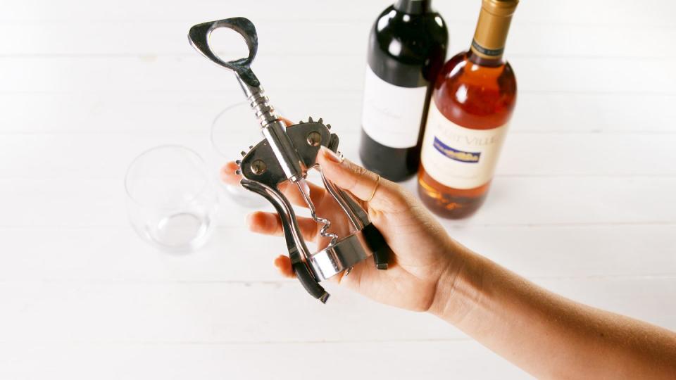 Bottle, Wine bottle, Beer bottle, Alcohol, Product, Nail, Hand, Finger, Glass bottle, Fashion accessory, 