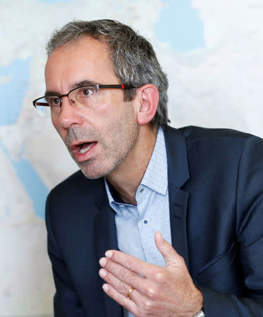 Dominik Stillhart, Director of Operations for the International Committee of the Red Cross (ICRC), gestures during an interview with Reuters in Geneva, Switzerland, December 1, 2016. REUTERS/Denis Balibouse