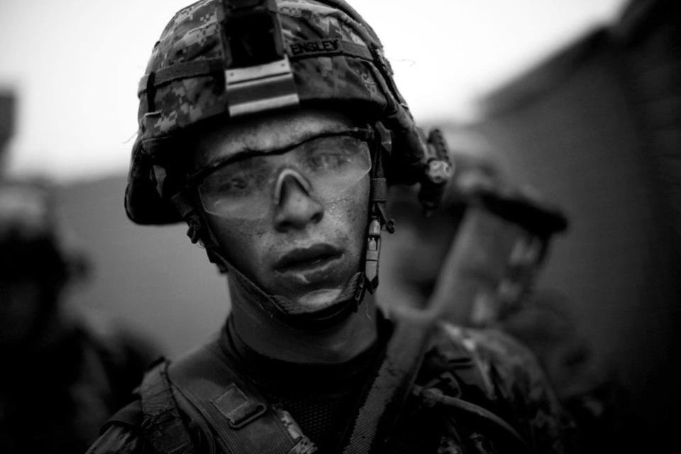 Bravo Company's Pvt. Cody Lee Ensley walks through the safety of the gates at an American base after a daylong fierce attack by insurgents near Payendi, Afghanistan. <i>From the story "<a href="http://www.npr.org/2010/10/22/130756452/signs-of-traction-in-u-s-fight-against-afghan-taliban" target="_blank">Signs Of Traction In U.S. Fight Against Afghan Taliban</a>,"&nbsp;2010.</i>