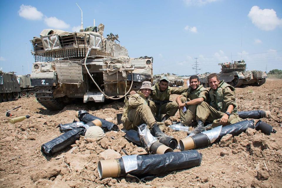 A view of a Merkava tank from the rear showing the open hatch leading to the internal compartment in its hull, which can also be used by the crew to escape in an emergency. IDF