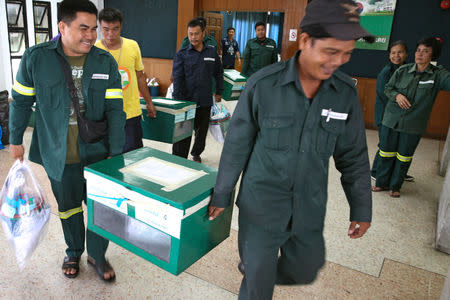 Bangkok district officers prepare ballot boxes and other documents ahead of the general election at a local district office in Bangkok, Thailand, March 23, 2019. REUTERS/Athit Perawongmetha