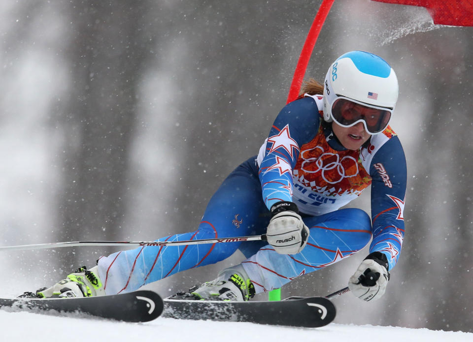 United States' Julia Mancuso passes a gate in the first run of the women's giant slalom at the Sochi 2014 Winter Olympics, Tuesday, Feb. 18, 2014, in Krasnaya Polyana, Russia. (AP Photo/Alessandro Trovati)