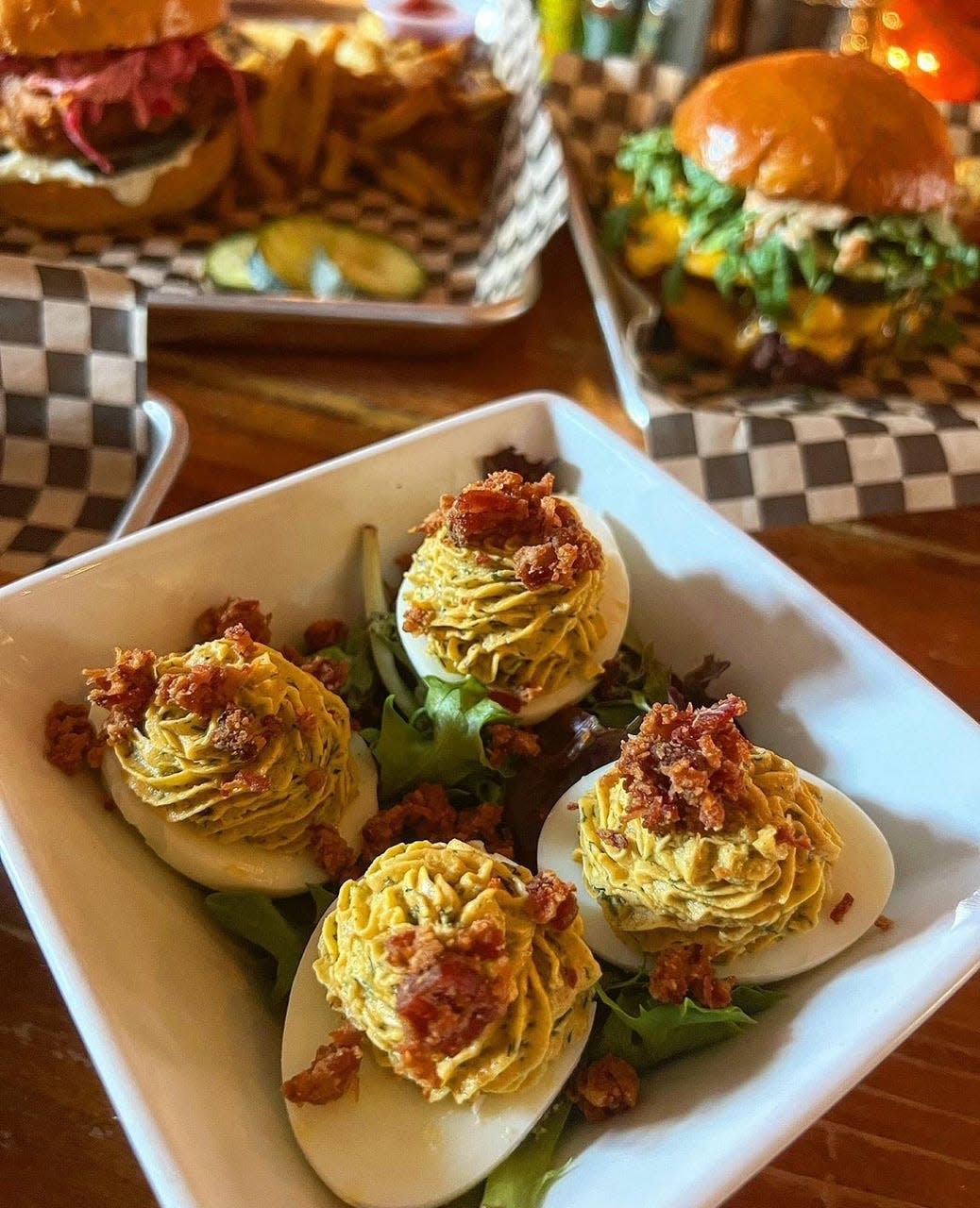 The brunch menu at Maxwell's on Main, in Doylestown Borough, includes a number of Creole-inspired dishes and appetizers, including these deviled eggs topped with pork belly cracklins.