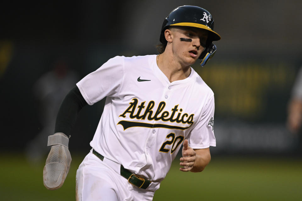 Oakland Athletics second base Zack Gelof (20) rounds third base against the Los Angeles Angels during the sixth inning of a baseball game Tuesday, July 2, 2024, in Oakland, Calif. (AP Photo/Eakin Howard)