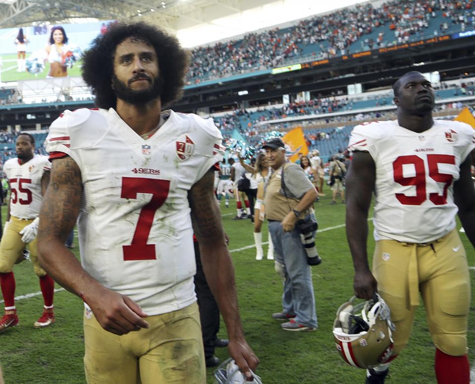 Colin Kaepernick, leaving the field after a loss in Miami last season, is still looking for work in the NFL. (AP) 