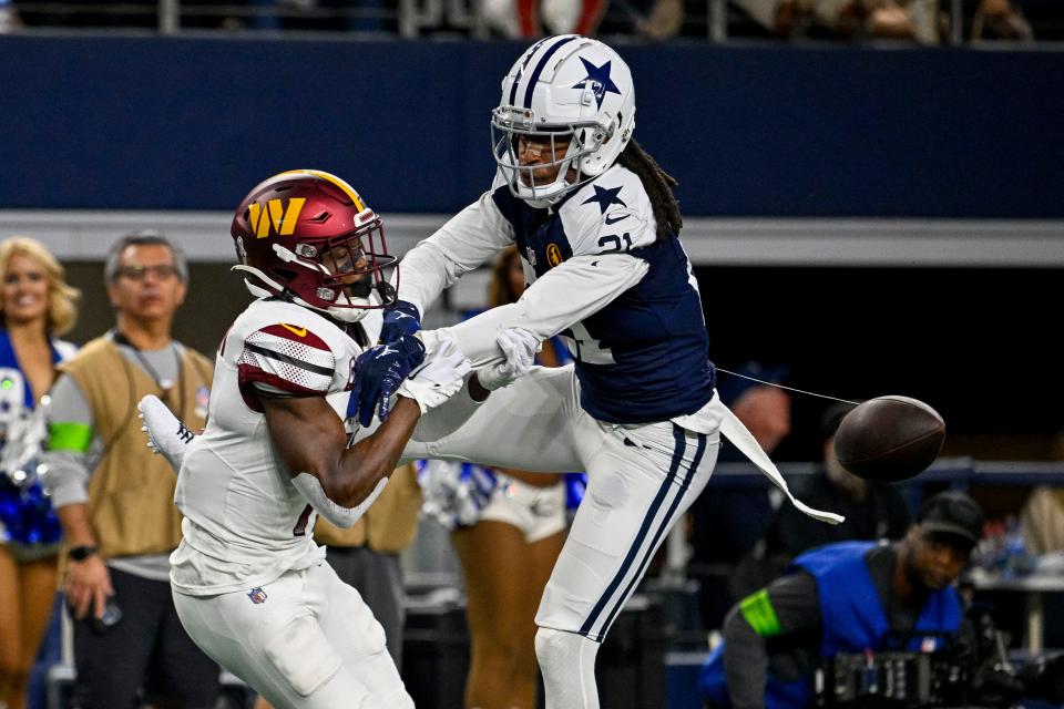 Dallas Cowboys cornerback Stephon Gilmore battles Washington Commanders receiver Terry McLaurin for the ball at AT&T Stadium, Nov. 23, 2023, Arlington, Texas.