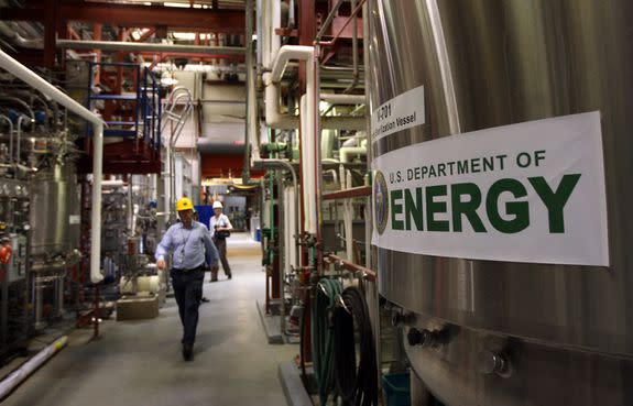 An engineer walks through the biofuels testing center at the Energy Department's National Renewable Energy Laboratory in Golden, Colorado, March 3, 2009.