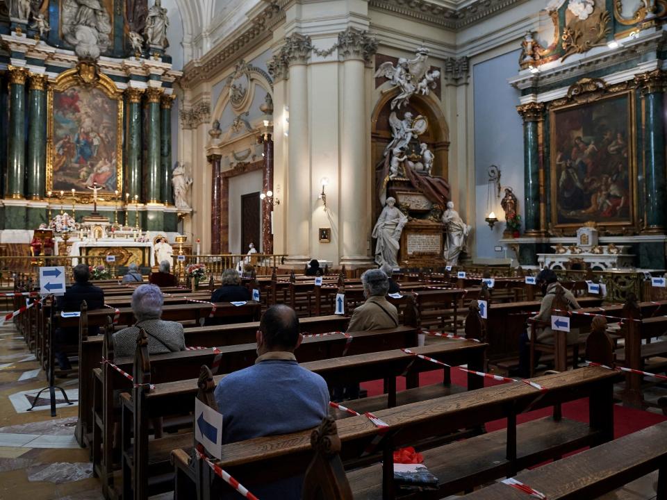 spain church coronavirus lockdown reopens social distancing