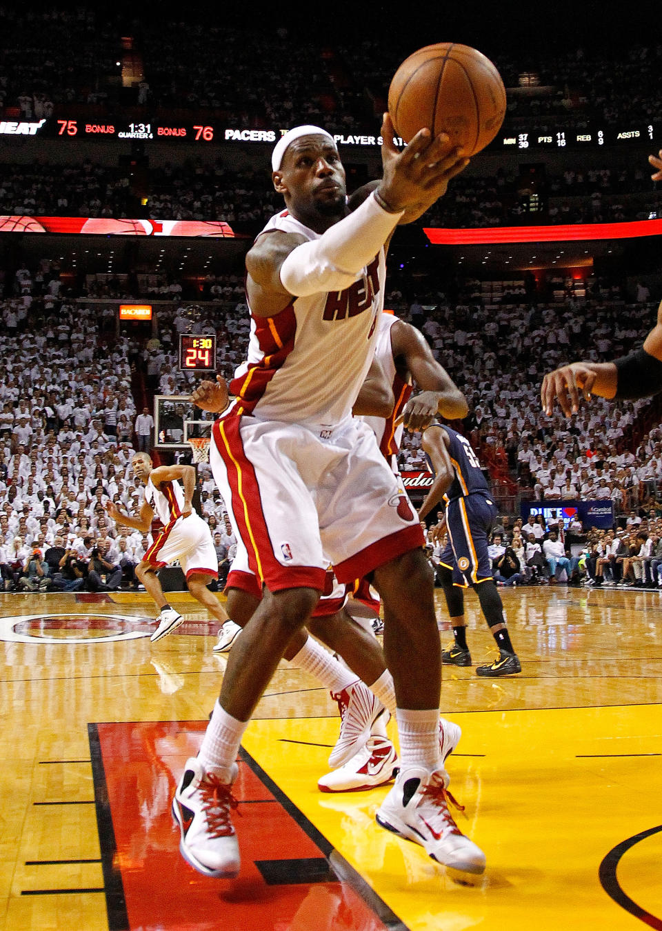 MIAMI, FL - MAY 15: LeBron James #6 of the Miami Heat rebounds the ball during Game Two of the Eastern Conference Semifinals in the 2012 NBA Playoffs against the Indiana Pacers at AmericanAirlines Arena on May 15, 2012 in Miami, Florida.