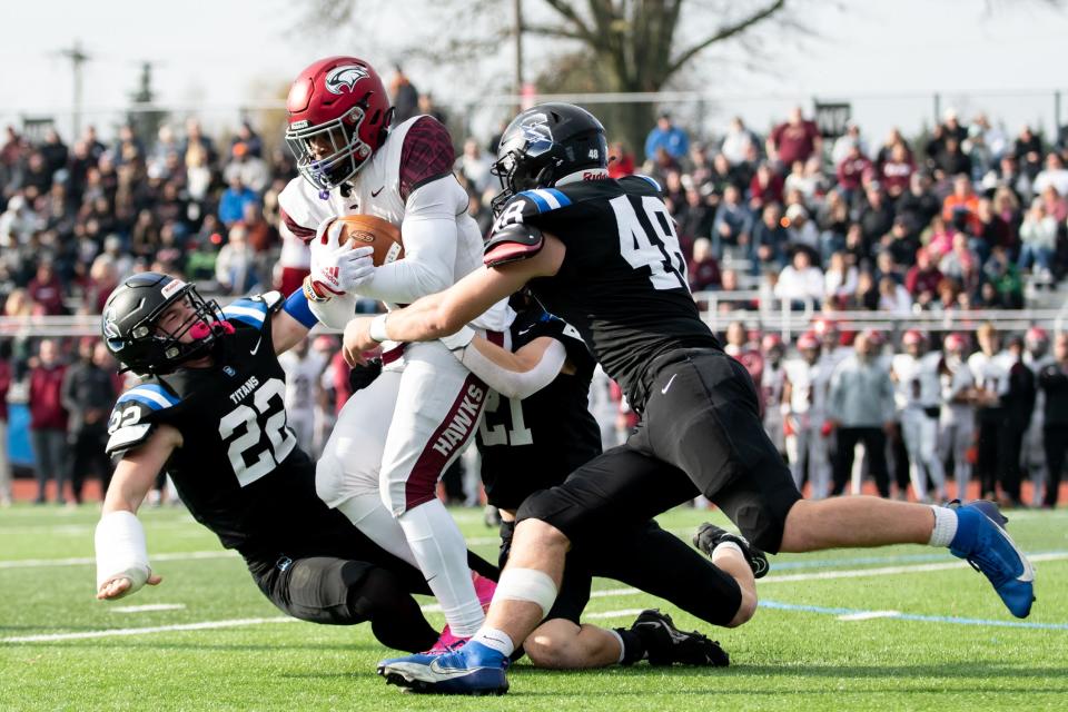 St. Joseph's Prep running back Isaiah West carries the ball in a PIAA Class 6A state semifinal game against Central Bucks  at North Penn High School in Towamencin on Dec. 2. West committed to Kentucky Friday night.