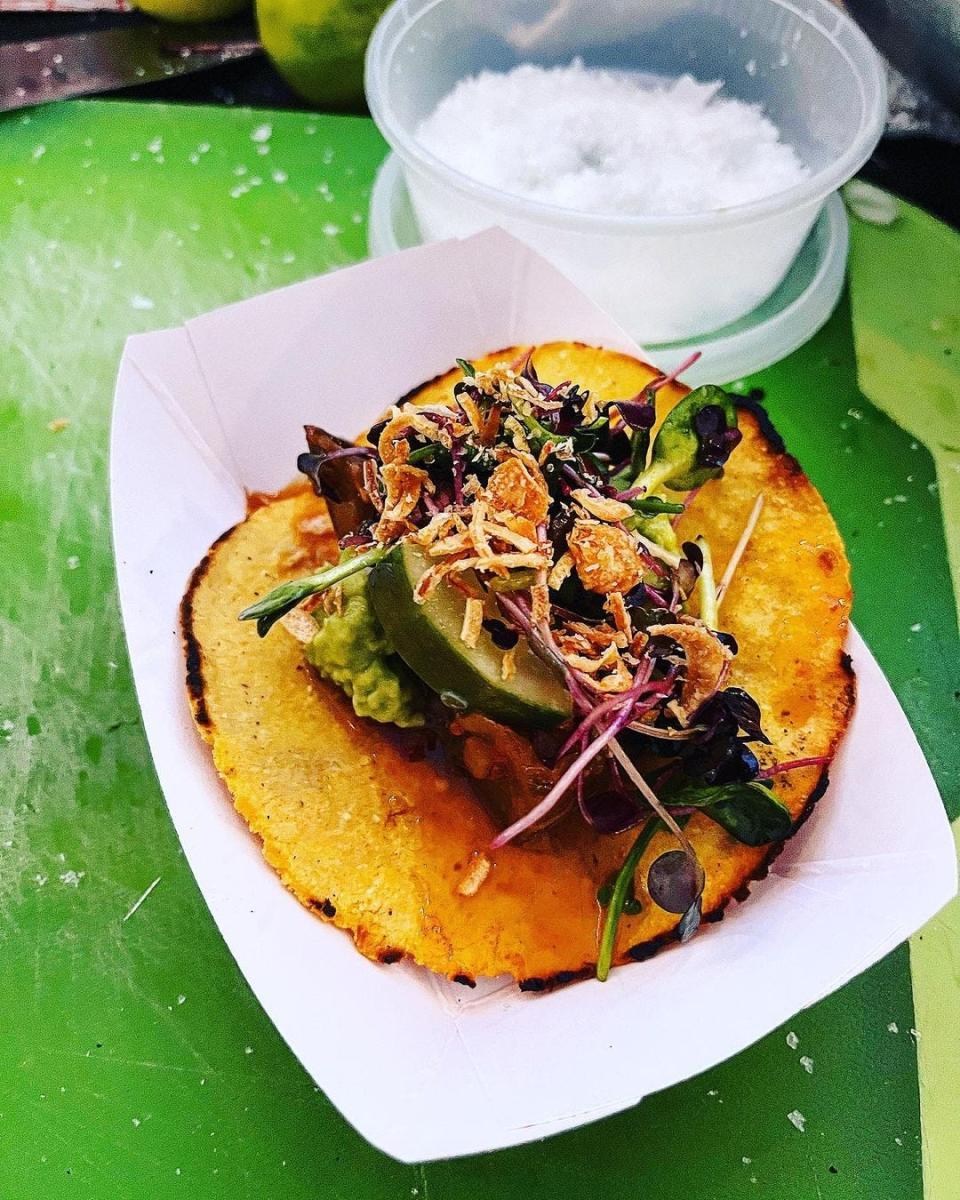 Striped bass tacos with Szechuan-style eggplant, guacamole and crispy garlic in handmade masa tortillas at the 2022 Red Gables event.