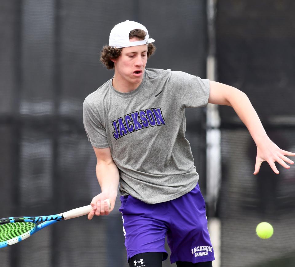 Jackson's No. 1 seed Alvin Altman plays Hoover's Colin Fitzgerald in Federal League Tennis at Jackson Community Courts.  Saturday, April 30, 2022.