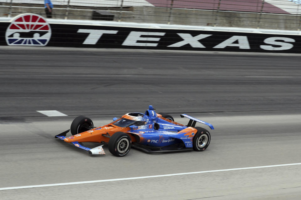 Scott Dixon comes out of turn four during an IndyCar Series auto race at Texas Motor Speedway on Sunday, May 2, 2021, in Fort Worth, Texas. (AP Photo/Richard W. Rodriguez)