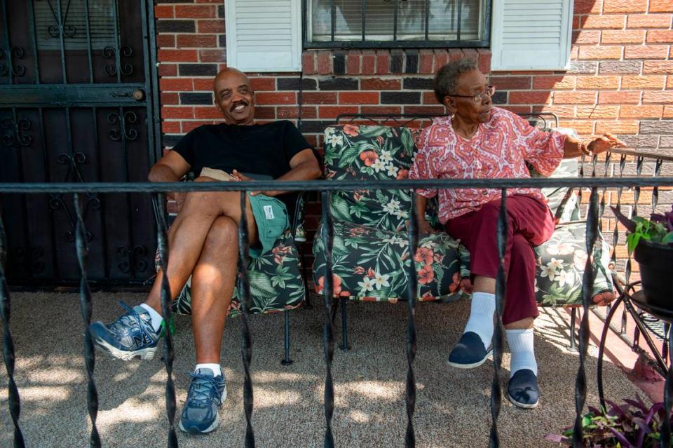 Mattie Young and her son-in-law, Walter Harrison, sit on the porch at her house on Martin Luther King Jr. Avenue in Ocean Springs on Tuesday, Sept. 26, 2023. Mattie Young’s house is also listed under the city’s proposed Urban Renewal Plan for ‘possible acquisition.’