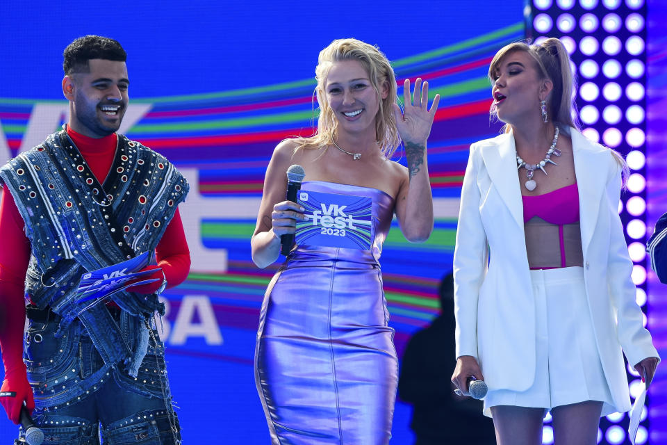 TV presenter and actress Anastasia Ivleeva, center, performs during VK Festival in Moscow, Russia, Saturday, July 15, 2023. Ivleeva hosted a bash at a Moscow nightclub with the stated dress code of "almost naked" reflects the rise of fiercely conservative sentiment in Russia amid President Vladimir Putin's repeated denunciation of the West for trying to undermine "traditional values" and the nationalism intensified by Russia's war in Ukraine. (AP Photo)