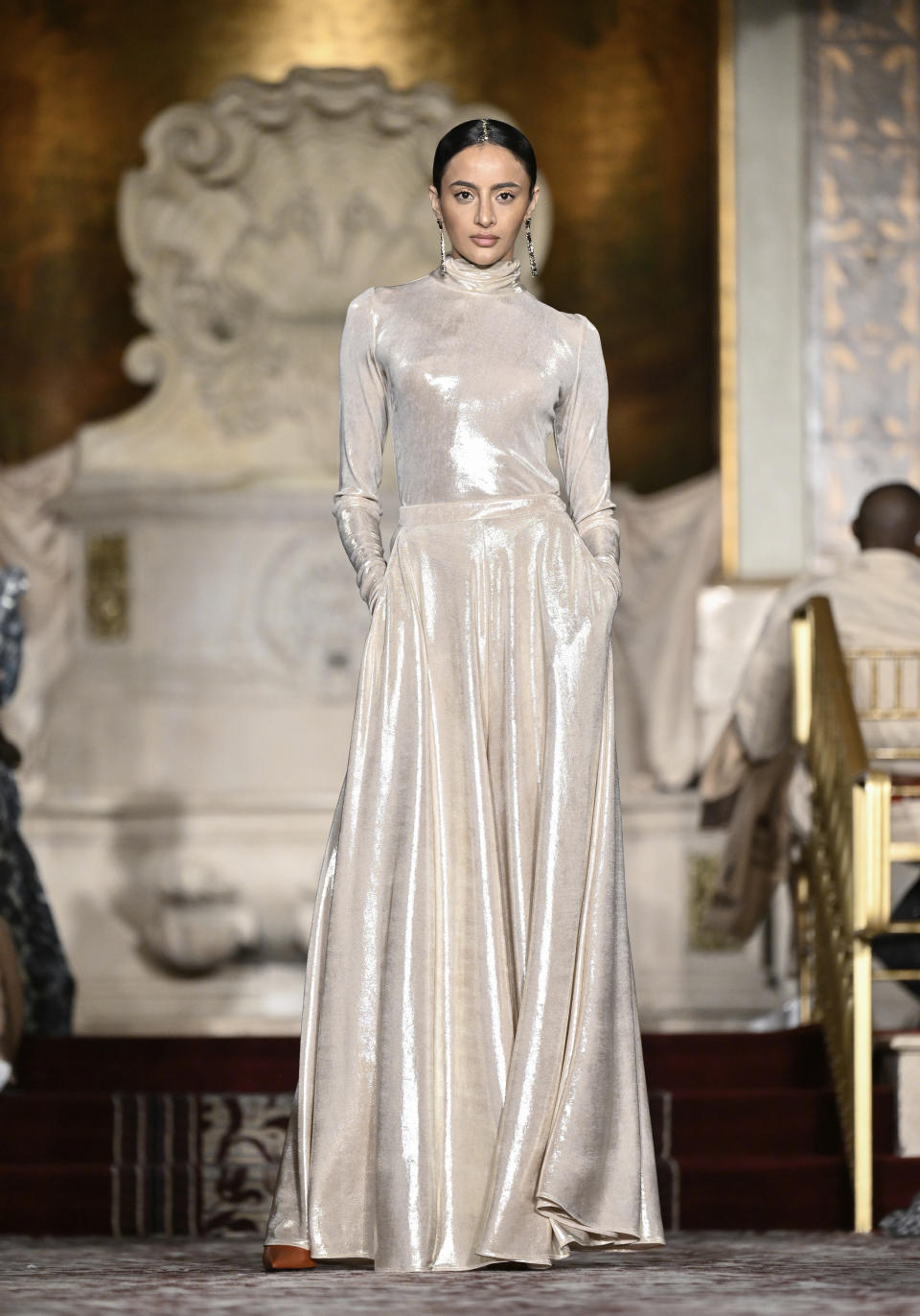 A model walks the runway during the Christian Siriano Fall/Winter 2024 fashion show at The Plaza Hotel during New York Fashion Week on Thursday, Feb. 8, 2024, in New York. (Photo by Evan Agostini/Invision/AP)