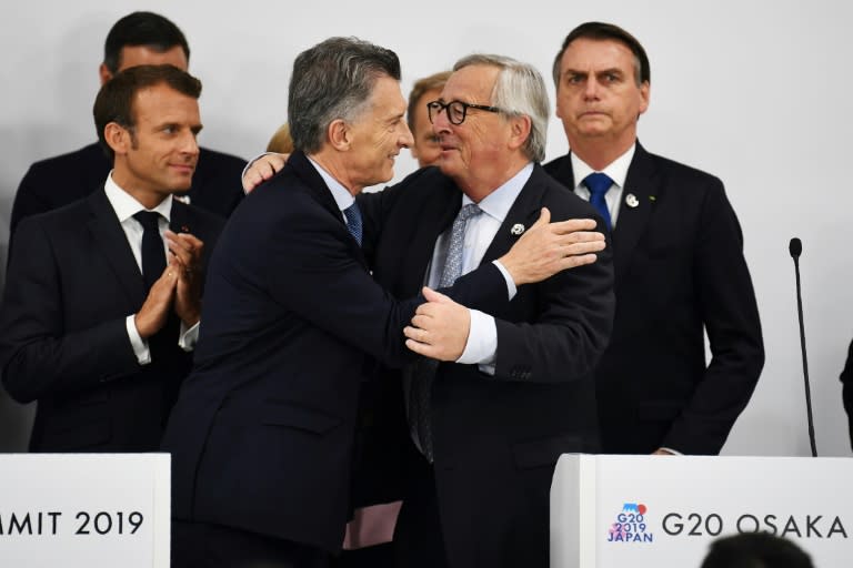 The EU and the South American trade bloc Mercosur sealed a blockbuster trade deal after 20 years of talks, with EC President Jean-Claude Juncker (2ndR) hailing it as a "strong message" in support of "rules-based trade"