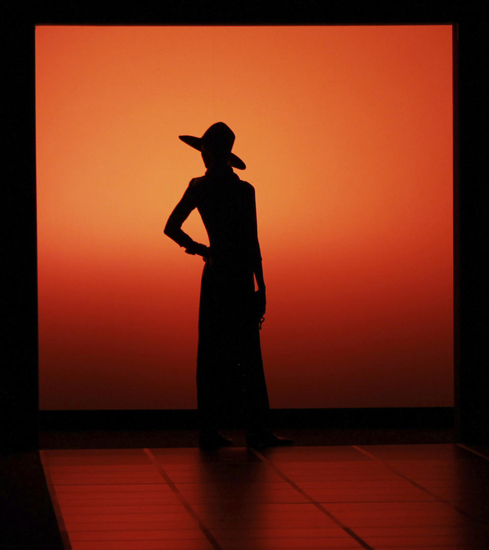 A model wears a creation part of the Giorgio Armani Women's Fall-Winter 2012-13 fashion collection, during the fashion week in Milan, Italy, Monday, Feb. 27, 2012. (AP Photo/Antonio Calanni)