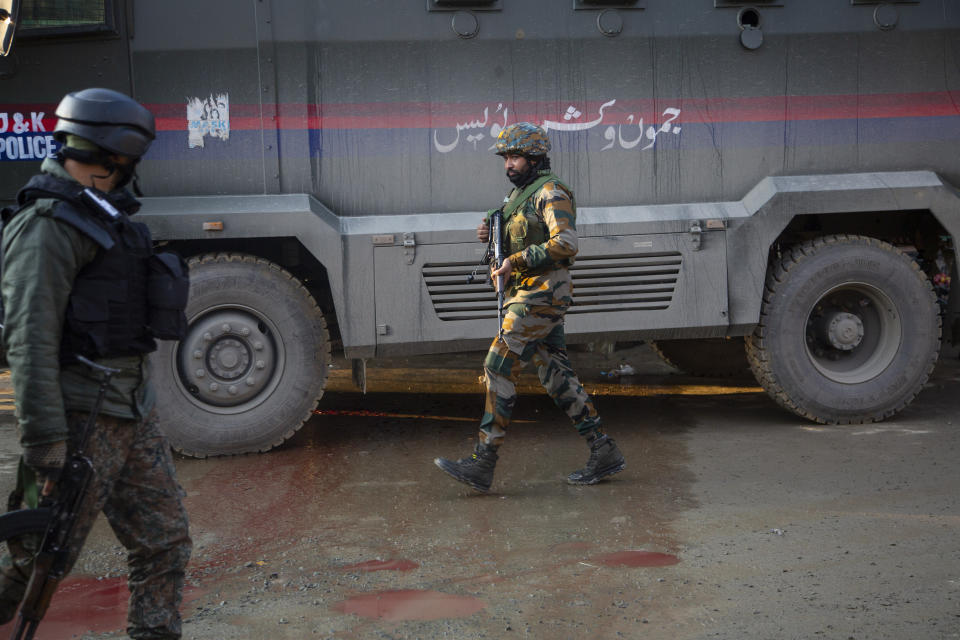 Indian soldiers patrol at the site of an attack on the outskirts of Srinagar, Indian controlled Kashmir, Thursday, Nov. 26, 2020. Anti-India rebels in Indian-controlled Kashmir Thursday killed two soldiers in an attack in the disputed region’s main city, the Indian army said.(AP Photo/Mukhtar Khan)