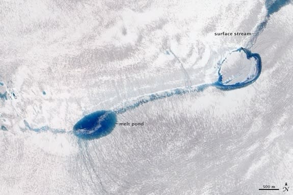 Melt ponds on the Greenland ice sheet.