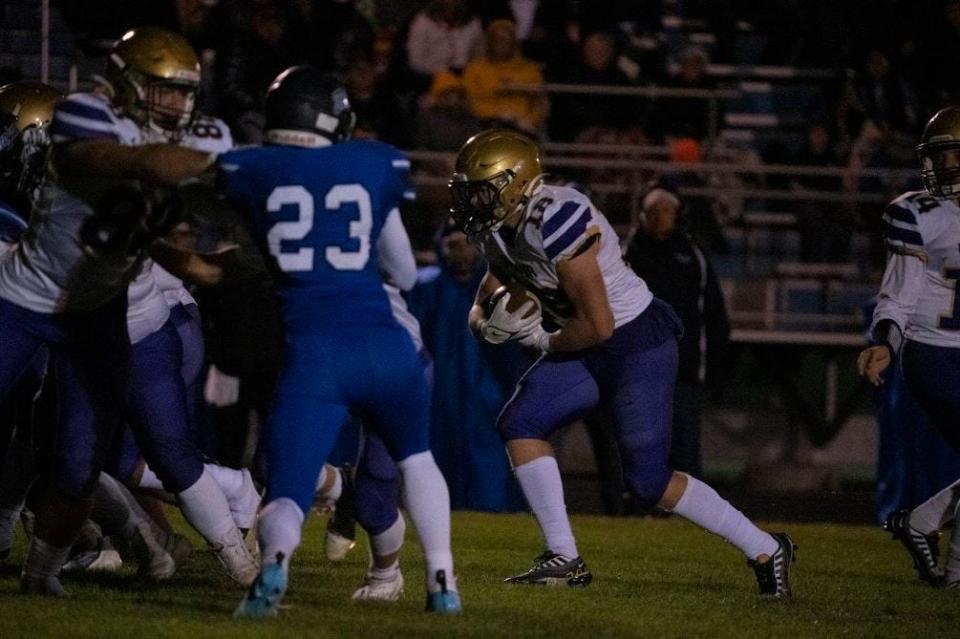 Winner running back Karson Keiser (6) finds a hole in the defense during a game against West Central on Friday. Winner earned a 28-0 win.