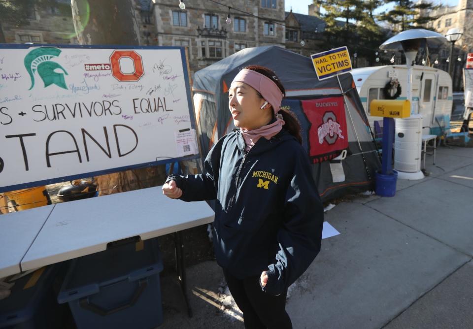 University of Michigan student Eleanor Wang talks about the firing of president Mark Schlissel on Sunday, Jan.16, 2022 in Ann Arbor.