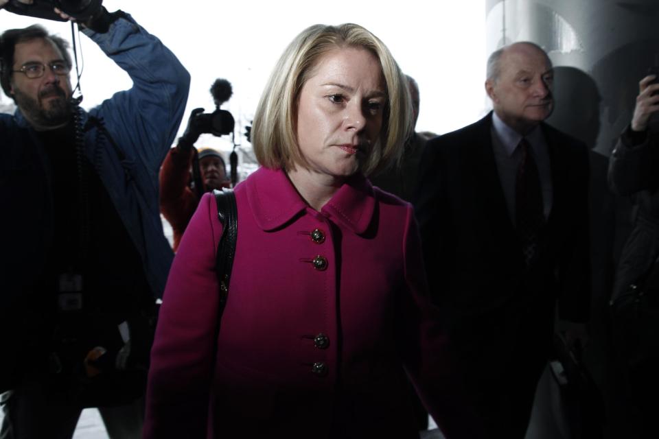 New Jersey Gov. Chris Christie's former Deputy Chief of Staff Bridget Kelly, and her attorney Michael Critchley, right, arrive at court for a hearing Tuesday, March 11, 2014, in Trenton, N.J. Attorneys for Kelly and two-time campaign manager Bill Stepien are in court to try to persuade a judge not to force them to turn over text messages and other private communications to New Jersey legislators investigating the political payback scandal ensnaring Christie's administration. (AP Photo/Mel Evans)