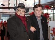 Director Aki Kaurismaki (R) is escorted by Festival director Dieter Kosslick for the screening of the movie 'The Other Side of Hope' at the 67th Berlinale International Film Festival in Berlin, February 14, 2017. REUTERS/Axel Schmidt