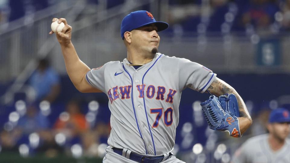 New York Mets starting pitcher Jose Butto (70) pitches against the Miami Marlins during the first inning at loanDepot Park.