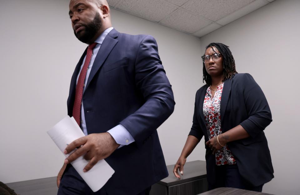 Carlishia Hood and her attorney, Brandon Brown, leave after a press conference in Chicago, Tuesday, June 27, 2023, after charges against Hood and her son were dropped after a deadly shooting at a restaurant. Hood, who was accused of telling her teen son to shoot a man at a fast food restaurant is suing the city and arresting officers, a day after murder charges against her and her son were dropped.