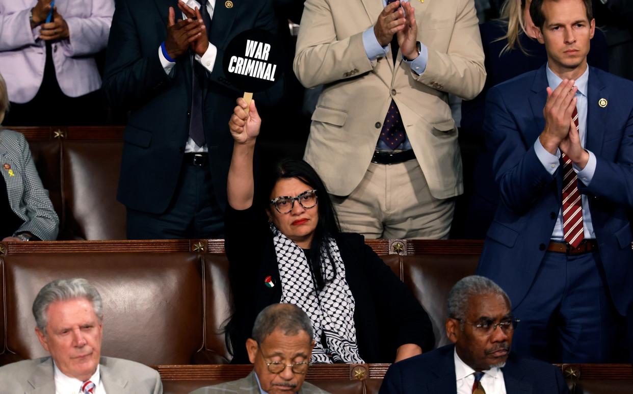 Rashida Tlaib wears a Palestinian keffiyeh in the Senate chamber