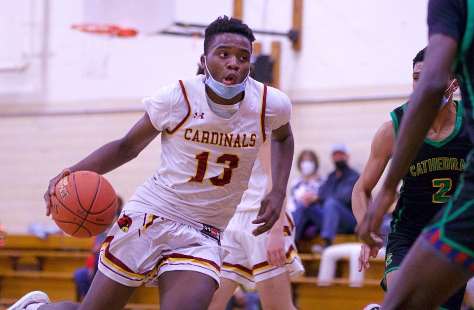 Cardinal Spellman's Jaydan Exalus drives to the basket during a game against Cathedral on Thursday, Jan. 6, 2022.