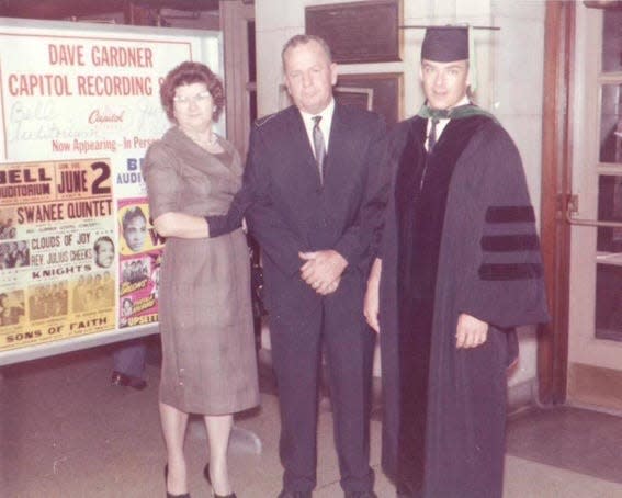 Jack Murphy and his parents at graduation