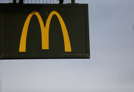 A McDonald's sign is displayed on a restaurant in London, Britain December 9, 2016. REUTERS/Neil Hall