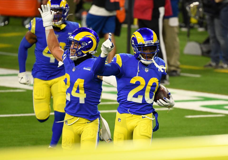 Los Angeles Rams cornerback Jalen Ramsey (20) celebrates making a fourth quarter interception against the Chicago Bear at SoFi Stadium.