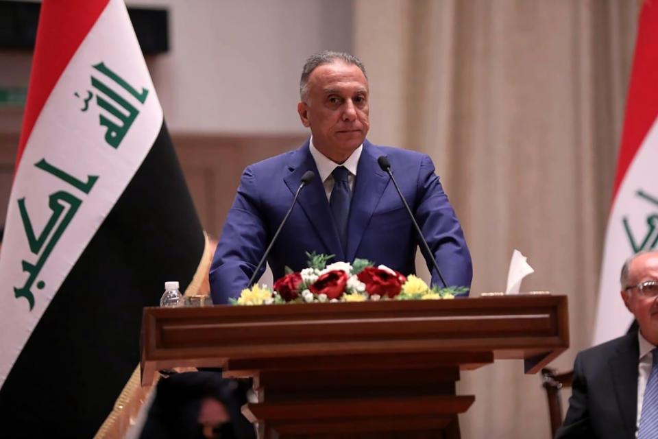 Mustafa al-Kahdimi, Iraqi Prime Minister-designate speaks to members of the Iraqi parliament in Baghdad, Iraq, Thursday, May 7, 2020. Iraq's former spy chief was sworn in early Thursday as the prime minister by lawmakers after weeks of tense political negotiations as the country faces a severe economic crisis spurred by the coronavirus pandemic. The parliament approved the government of al-Kahdimi after long wrangling over his proposed Cabinet. (Iraqi Parliament Media Office, via AP)