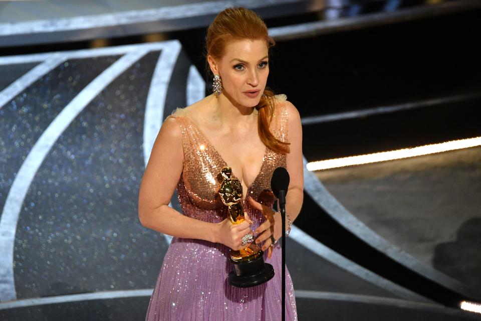 US actress Jessica Chastain accepts the award for Best Actress in a Leading Role for her performance in 