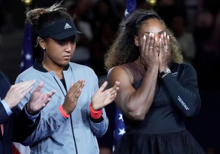 Sept 8, 2018; New York, NY, USA; Serena Williams of the USA (right) cries while standing next to Naomi Osaka of Japan at the trophy presentation after the women’s final on day thirteen of the 2018 U.S. Open tennis tournament at USTA Billie Jean King National Tennis Center. Robert Deutsch-USA TODAY Sports