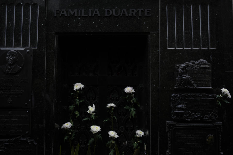 Flowers adorn the tomb of Argentina's late former first lady Maria Eva Duarte de Peron, better known as "Evita" in Buenos Aires, Argentina, Monday, July 25, 2022. Argentines commemorate the 70th anniversary of the death of their most famous first lady on Tuesday, Evita who died of cancer on July 26, 1952, at the age of 33. (AP Photo/Natacha Pisarenko)