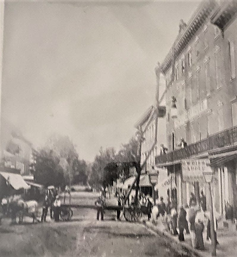 Joseph R. Winters invented the scissor-type ladder truck in 1877 and he was granted a patent in 1878. This is Winters' ladder truck in operation on North Main Street in Chambersburg in 1878.